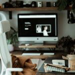 black flat screen tv on brown wooden tv rack